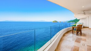 A balcony with a clear view of the sea and distant islands. - Blue Horizon 603 | 2BR/3BA Puerto Vallarta, Ocean View, Pool, Hot Tub (Puerto Vallarta)