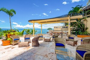Terrace/patio - Luxe 2nd-floor condo with endless ocean views, pool, spa & balcony (Puerto Vallarta)