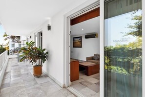 Terrace/patio - Luxurious partial ocean-view suite with 3 pools, hot tub, gym & balcony (Puerto Vallarta)