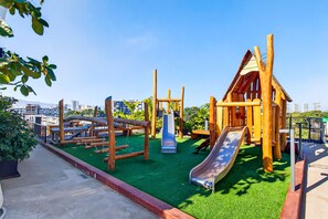 Children’s area - Modern condo with rooftop pool, balcony, gas grill & gym access (Puerto Vallarta)