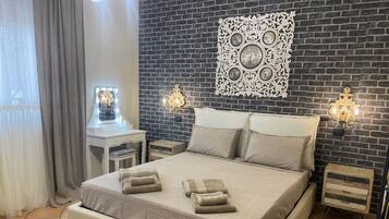 3 habitaciones, tabla de planchar con plancha, wifi y ropa de cama