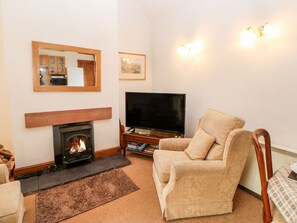 Fireplace - The Byre: Charming Retreat in Milton (Brampton)