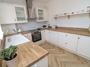 Dishwasher, high chair - The Miners Cottage Scremerston (Berwick-upon-Tweed)