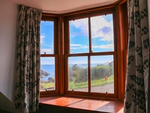 A bay window with a view of a coastal landscape. - Seascape, Portknockie (Buckie)