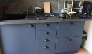 Fridge, microwave, stovetop, coffee/tea maker