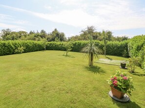 Property grounds - Berllan in Benllech, Anglesey. (Llanbedrgoch)