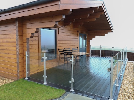 Terrace/patio. Height End Farm Log Cabin, TV.