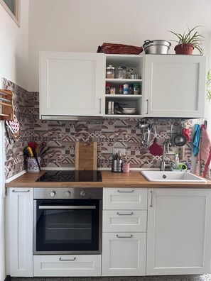 Private kitchen - Central apartment a stone's throw from the lake "La Vattutella" Marta (Marta)