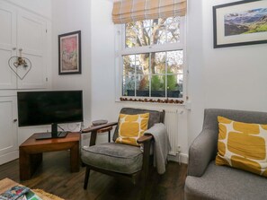 Fireplace - Acorn Cottage is in Windermere (Windermere)