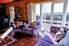 TV, fireplace - Bungalow with Sea & Mountain Views I Huge Decking (Downings)