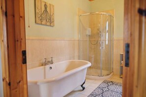 Shower, hair dryer, towels, shampoo