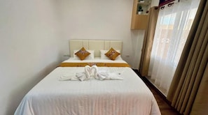 Chambre, balcon, vue jardin | Wi-Fi gratuit