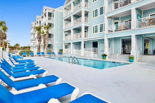 Beach Access 2BR @Grand Caribbean • Sleeps 6 • Views, Balcony & Pool