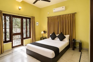 Deluxe Room, City View | Laptop workspace, WiFi (free), bed sheets - Next Generation Guest House (Bidhannagar)