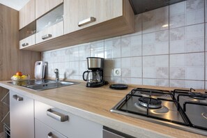 Familjelägenhet - flera sovrum (Apartment Lea Puče) | Eget kök | Kylskåp, ugn, spishäll och diskmaskin