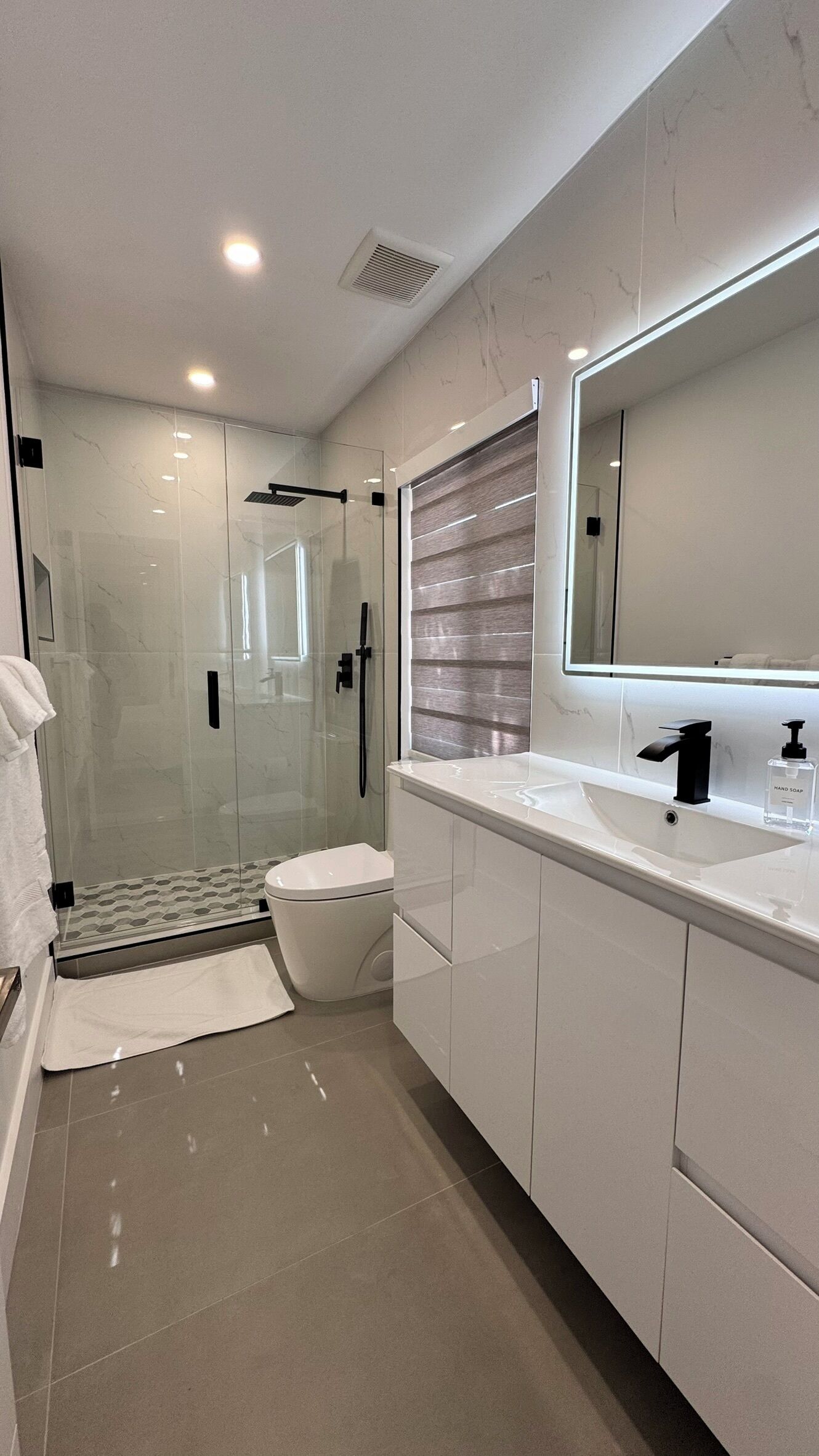 Hair dryer, towels, soap, toilet paper