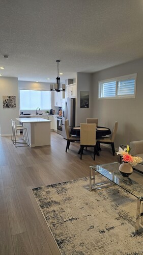 Brand new 4-bedroom+Den main floor unit in quiet Creekview community, SW Calgary