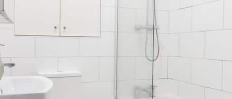 Hair dryer, towels, soap, toilet paper