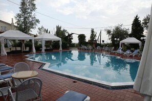 Seasonal outdoor pool, pool umbrellas - SKG Assembly Hotel (Chalkidona)