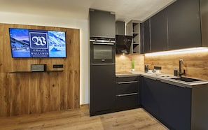 Design Condo, Balcony, Mountain View | Private kitchen | Highchair - Chalet Wallehen by we rent (Saalbach)