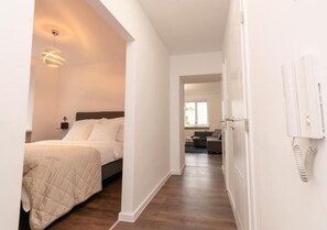 1 habitación, tabla de planchar con plancha, wifi y ropa de cama 