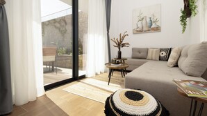 Ein Wohnzimmer mit einer Couch, einem Couchtisch, einem Teppich und einem Fenster mit Vorhängen.