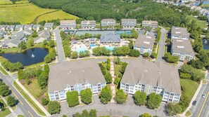 Exterior - Beautifully Decorated 4-Bedroom, 3-Bathroom Pet Friendly Condo with Elevator Access:  Walk to all Freeman Stage, Pools, Fitness Center and More in the amenity-rich Bayside Resort and Golf Community. (Selbyville)