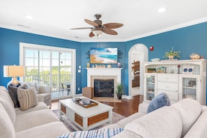 Smart TV, fireplace, books, offices