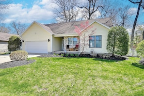 A single-story house with a garage, a front porch, and a well-maintained lawn. - 3 Mi to Beach From 'the Harbor Collective' (New Buffalo)