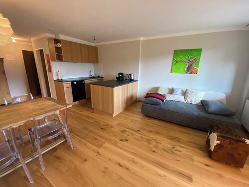 Newly renovated vacation rental in Flims X Laax with a balcony, underground parking, indoor pool, and sauna