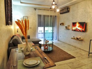 Apartment, 1 Bedroom | Living room - Waterfront, Free Parking, Comfort & Style (Mohammedia)