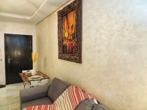 Apartment, 1 Bedroom | Living room - Waterfront, Free Parking, Comfort & Style (Mohammedia)