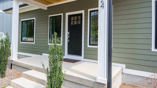 A house with a porch, steps, and a black front door. - Modern Upper Retreat w Free Tix Deck 2 Suites (Hendersonville)