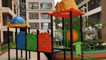 Apartamento, 4 quartos, acessível, para fumantes | Área infantil