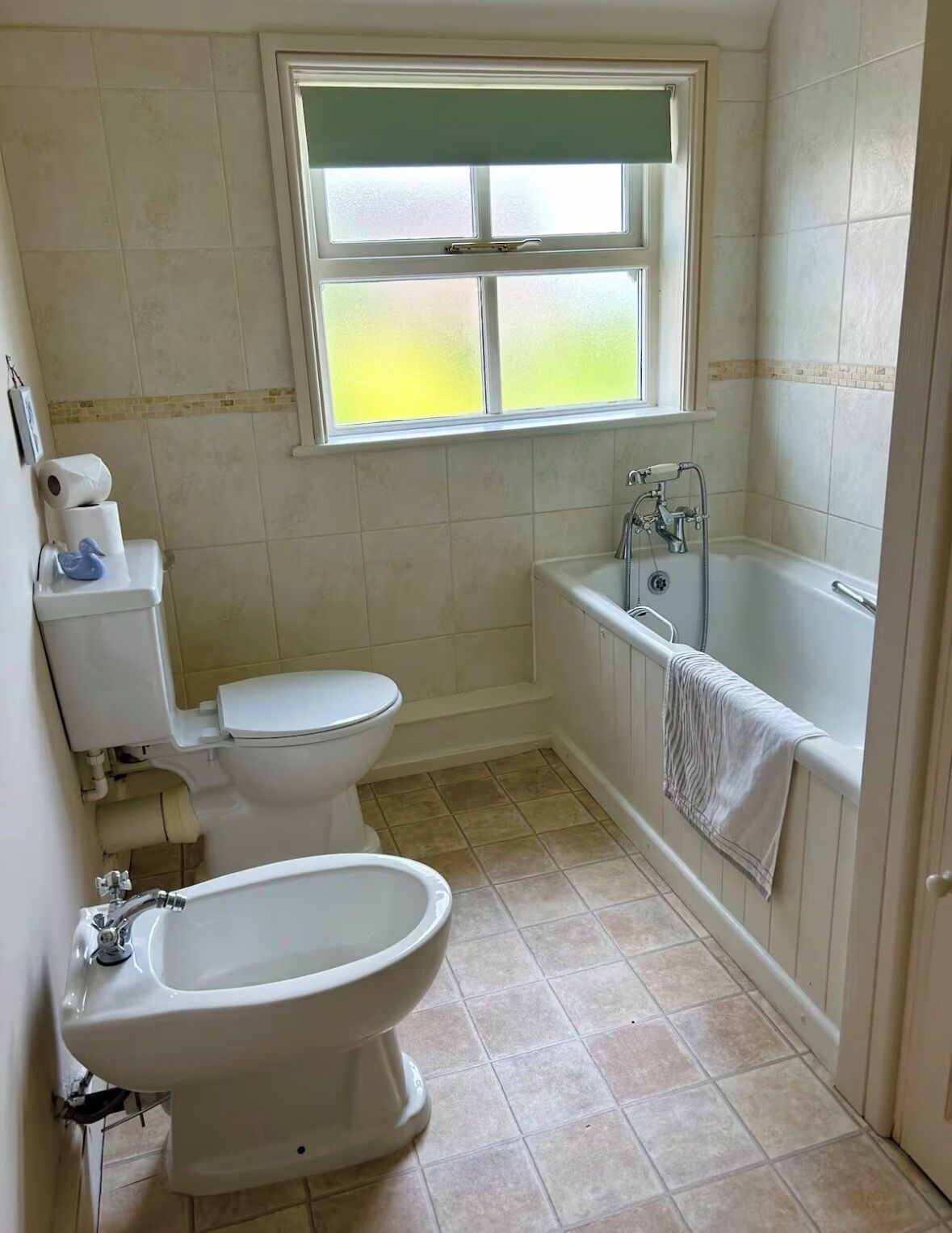 Hair dryer, bidet, towels, soap