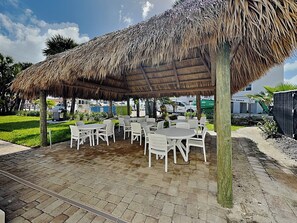 Outdoor dining - Pointe South 304 | Gulf Front + Heated Pool (Fort Myers Beach)