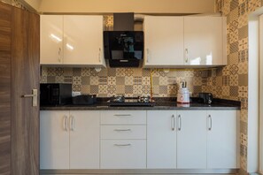 Deluxe-Apartment, Balkon, Gartenblick | Eigene Küche