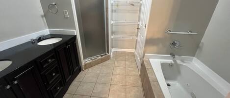 Jetted tub, hair dryer, towels, soap