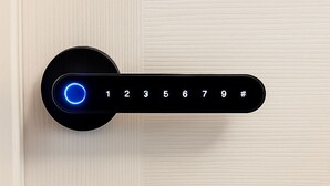 A door with a numeric keypad lock. - Cabana (Miami)