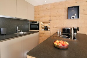Apartment, Balcony, Garden View | Private kitchen - Chalet Hohe Welt - luxury apartments (Lech am Arlberg)