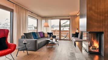 Apartment, 2 Bedrooms, Balcony, Mountain View | Living area | 42-inch flat-screen TV with cable channels, TV, fireplace
