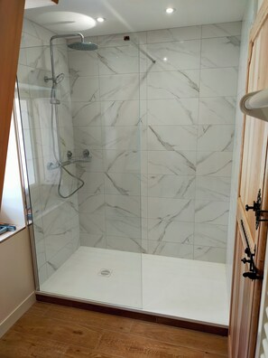 Shower, hair dryer, towels, soap