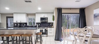 Dawg House 4BR Stay - Fenced Yard & Fast WiFi!