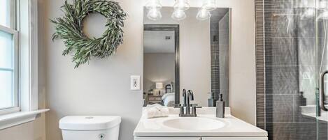 Shower, hair dryer, towels, soap