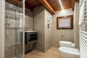 Double Room | Bathroom | Shower, hair dryer, bidet, towels