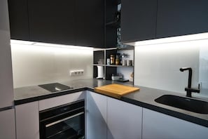 Superior Apartment, 1 Queen Bed with Sofa bed, Air conditioning, City View | Private kitchen | Full-size fridge, microwave, oven, stovetop