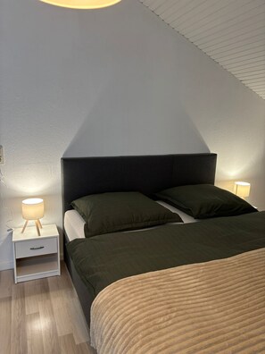 2 dormitorios, tabla de planchar con plancha, wifi y ropa de cama