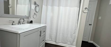 Hair dryer, towels, soap, toilet paper