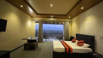 Family Quadruple Room, Balcony, Mountain View | Desk, laptop workspace, free WiFi