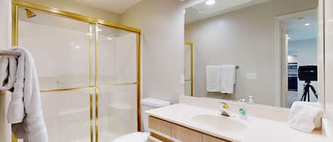 Shower, hair dryer, towels